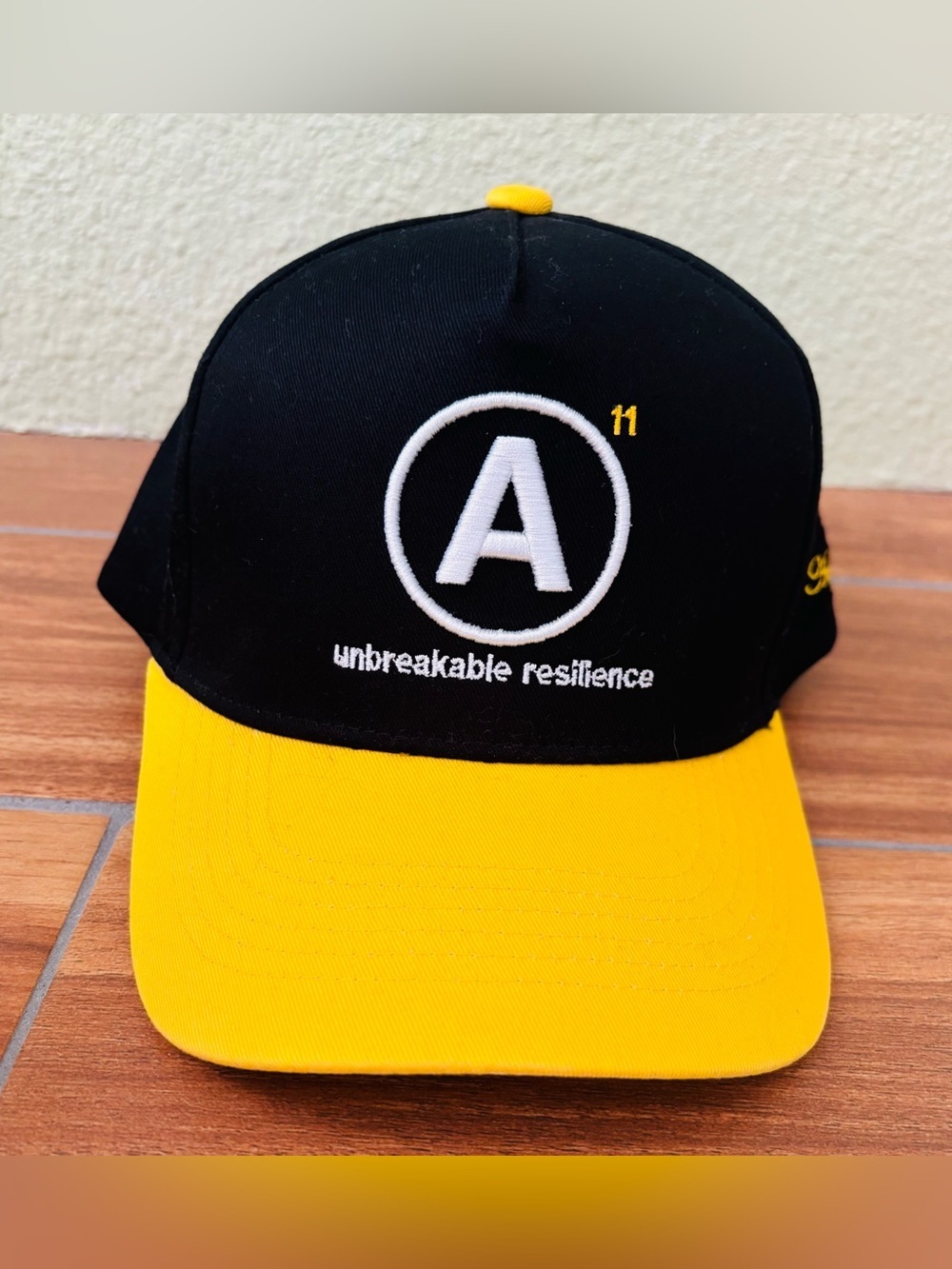 Aug 11 "Mega Snap Back" Black Yellow Hat Embroidered White Lettering w/"A" logo
